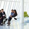 Businesspeople Having Meeting In Modern Office